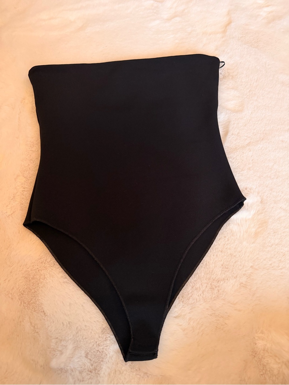 Strapless body suit